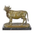 A BRONZE SCULPTURE OF A COW
