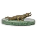 A BRONZE SCULPTURE OF A CROCODILE