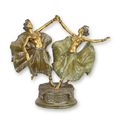A BRONZE SCULPTURE OF A DANCING COUPLE