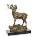 A BRONZE SCULPTURE OF A DEER