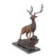 A BRONZE SCULPTURE OF A DEER