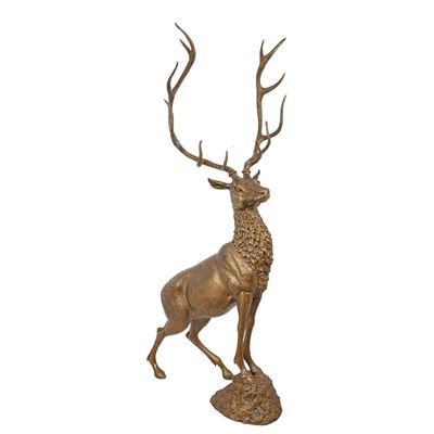 A BRONZE SCULPTURE OF A DEER
