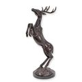 A BRONZE SCULPTURE OF A DEER
