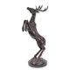 A BRONZE SCULPTURE OF A DEER
