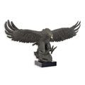 A BRONZE SCULPTURE OF A DESCENDING EAGLE