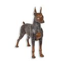 A BRONZE SCULPTURE OF A DOBERMAN