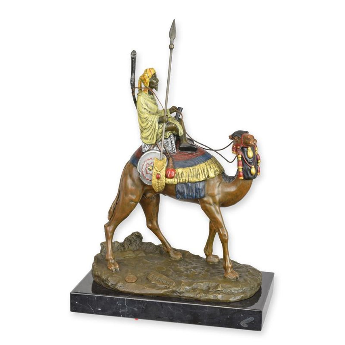 A BRONZE SCULPTURE OF A DROMEDARY AND RIDER