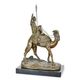 A BRONZE SCULPTURE OF A DROMEDARY AND RIDER