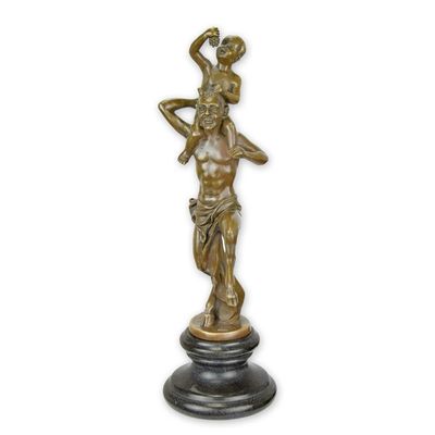 A BRONZE SCULPTURE OF A FAUN WITH LITTLE BACCHUS