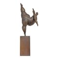A BRONZE SCULPTURE OF A FEMALE DANCER