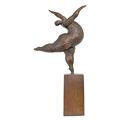 A BRONZE SCULPTURE OF A FEMALE DANCER