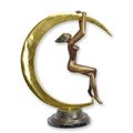 A BRONZE SCULPTURE OF A FEMALE NUDE AND CRESCENT MOON