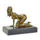A BRONZE SCULPTURE OF A FEMALE NUDE