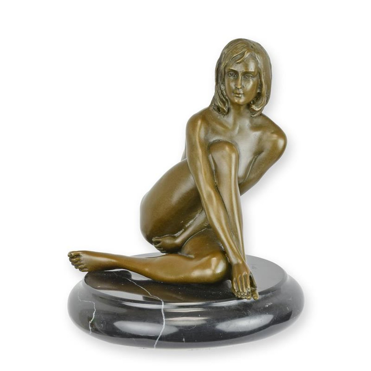 A BRONZE SCULPTURE OF A FEMALE NUDE
