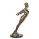 A BRONZE SCULPTURE OF A FEMALE NUDE