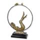 A BRONZE SCULPTURE OF A FEMALE NUDE WITH HOOP