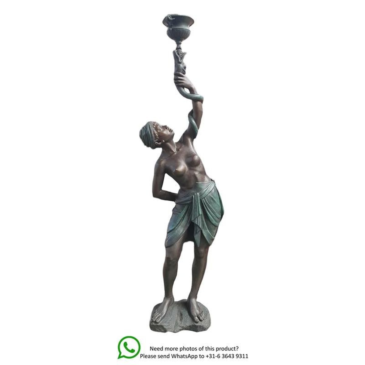 A BRONZE SCULPTURE OF A FIGURAL PLANTER