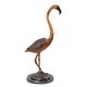 A BRONZE SCULPTURE OF A FLAMINGO