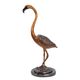 A BRONZE SCULPTURE OF A FLAMINGO
