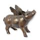 A BRONZE SCULPTURE OF A FLYING PIG