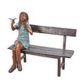 A BRONZE SCULPTURE OF A GIRL SITTING ON A BENCH
