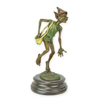 A BRONZE SCULPTURE OF A GOBLIN SOWING SEEDS