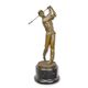 A BRONZE SCULPTURE OF A GOLFER