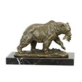 A BRONZE SCULPTURE OF A GRIZZLY BEAR