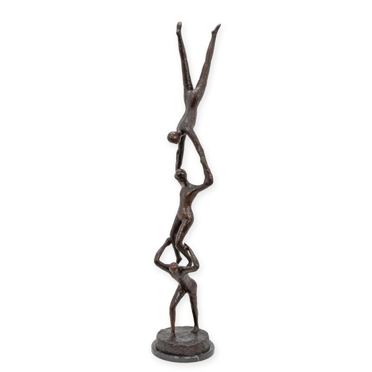 A BRONZE SCULPTURE OF A GROUP OF ACROBATS