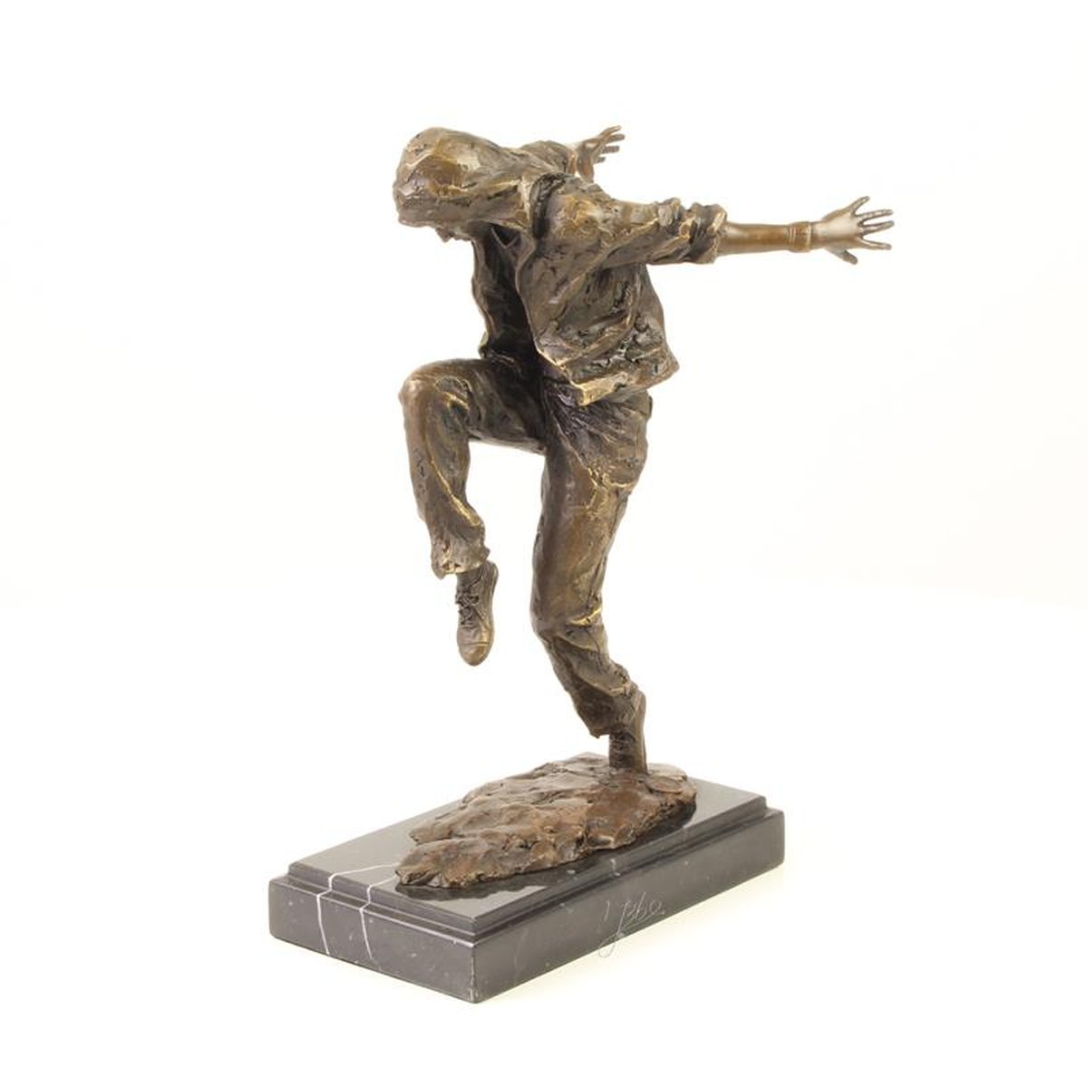A BRONZE SCULPTURE OF A HOODED STREETDANCER
