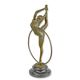 A BRONZE SCULPTURE OF A HOOP DANCER