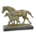 A BRONZE SCULPTURE OF A HORSE AND COLT