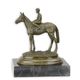 A BRONZE SCULPTURE OF A HORSE AND RIDER