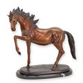 A BRONZE SCULPTURE OF A HORSE