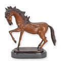 A BRONZE SCULPTURE OF A HORSE