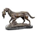 A BRONZE SCULPTURE OF A HOUND