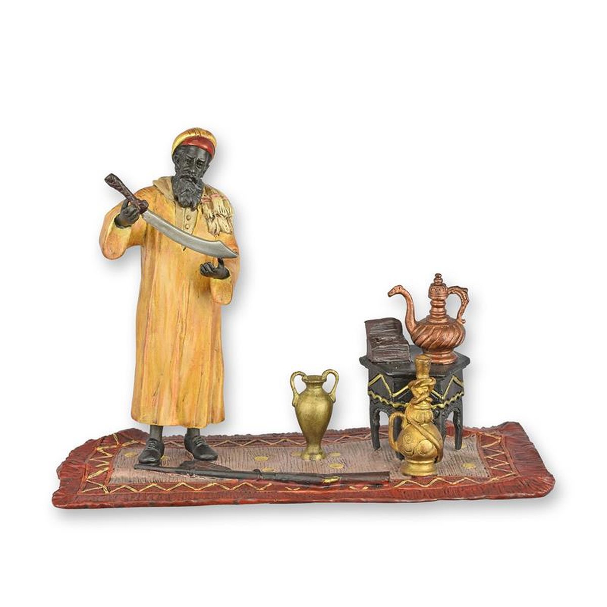 A BRONZE SCULPTURE OF A HUNTER WITH SWORD