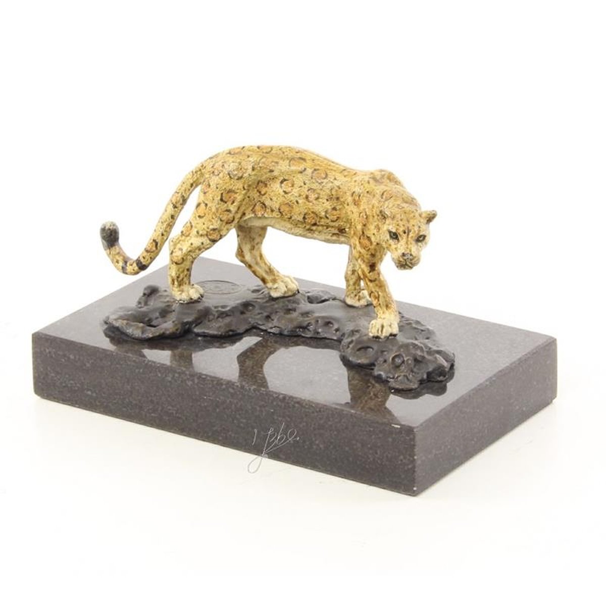 A BRONZE SCULPTURE OF A JAGUAR