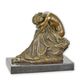 A BRONZE SCULPTURE OF A KNEELING BEAUTY