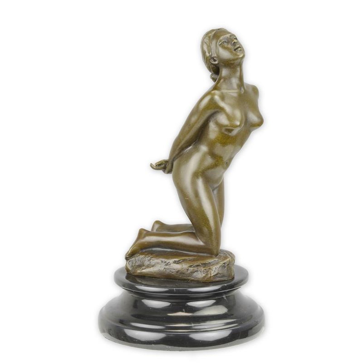 A BRONZE SCULPTURE OF A KNEELING NUDE