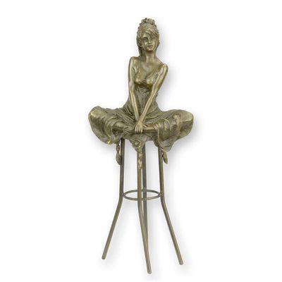 A BRONZE SCULPTURE OF A LADY ON BARCHAIR