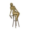 A BRONZE SCULPTURE OF A LADY ON BARCHAIR