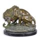 A BRONZE SCULPTURE OF A LION AND SERPENT