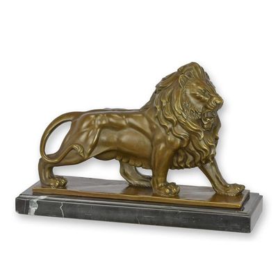 A BRONZE SCULPTURE OF A LION