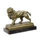 A BRONZE SCULPTURE OF A LION