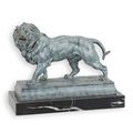 A BRONZE SCULPTURE OF A LION - GREEN FINISH