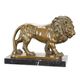 A BRONZE SCULPTURE OF A LION
