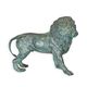 A BRONZE SCULPTURE OF A LION