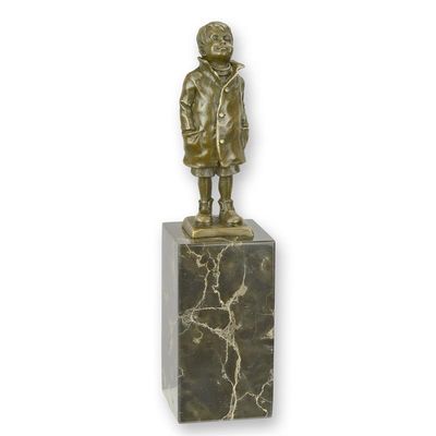 A BRONZE SCULPTURE OF A LITTLE BOY