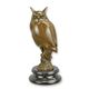 A BRONZE SCULPTURE OF A LONG-EARED OWL